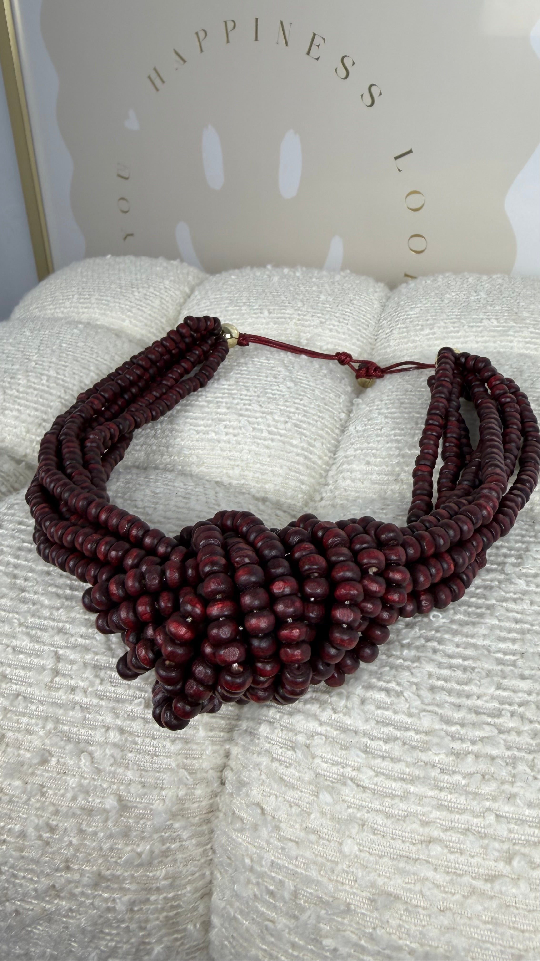 Collar nudo granate